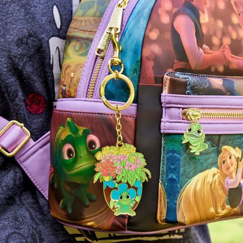 the Rapunzel Pascal Lenticular keychain hanging from the Rapunzel Scenes Mini Backpack 